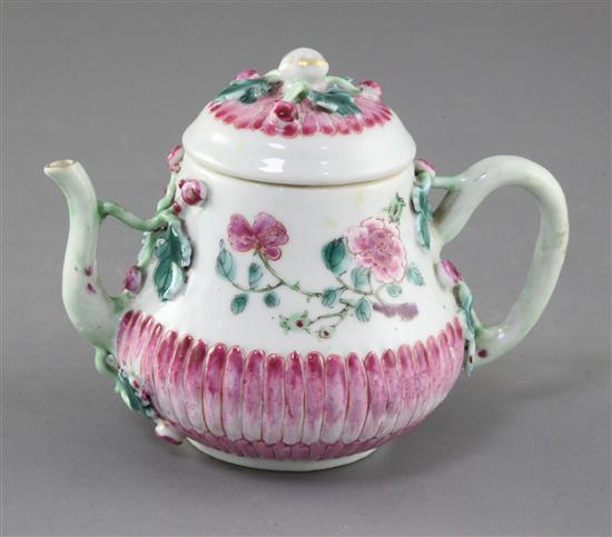 A Chinese famille rose chrysanthemum moulded wine pot and cover, early Qianlong period, height 11cm